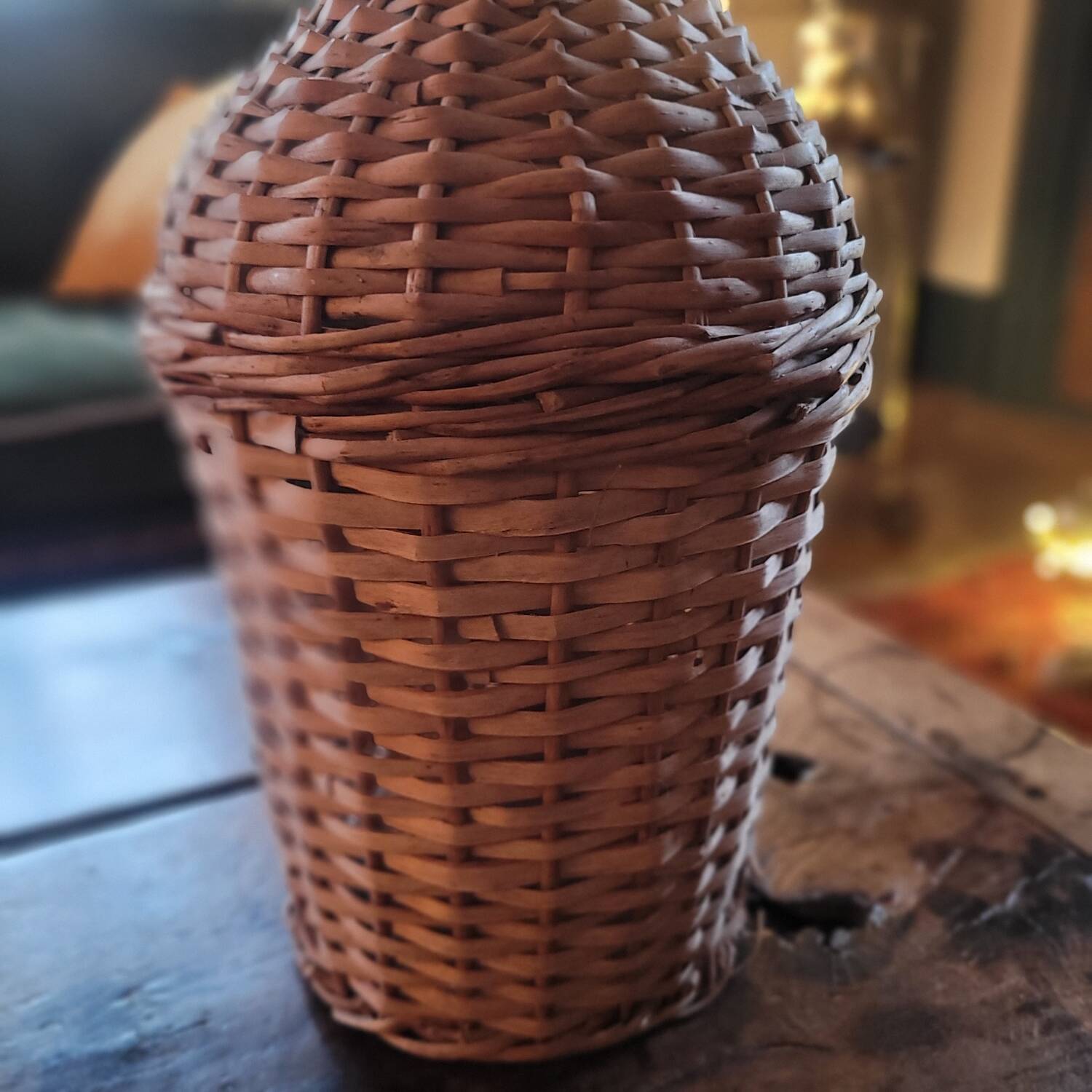 Glass demijohn encased in wicker, 1950s–1960s