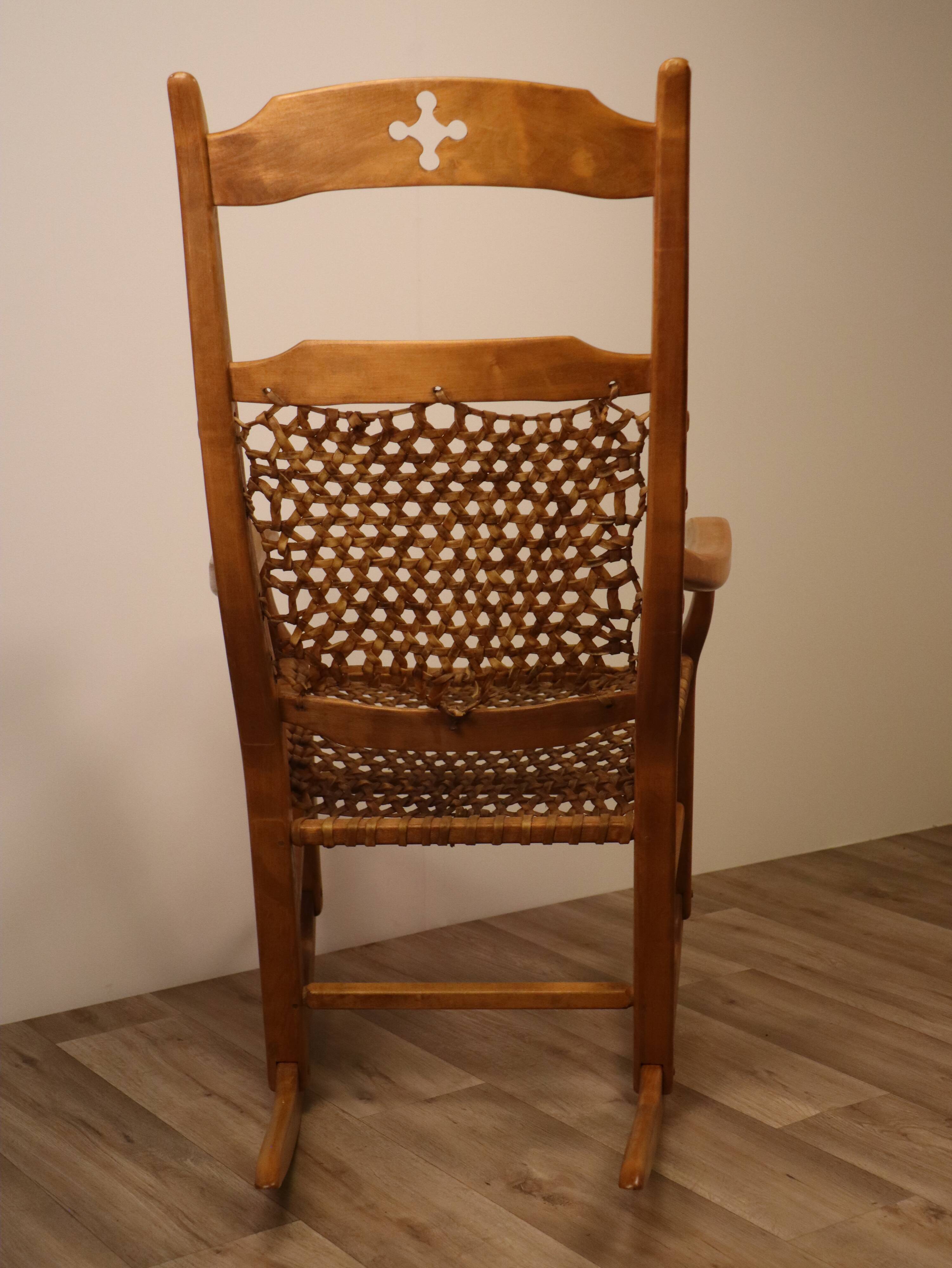 Vintage rocking chair in solid wood 1950