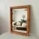 Vintage woven rattan mirror from the 70s.