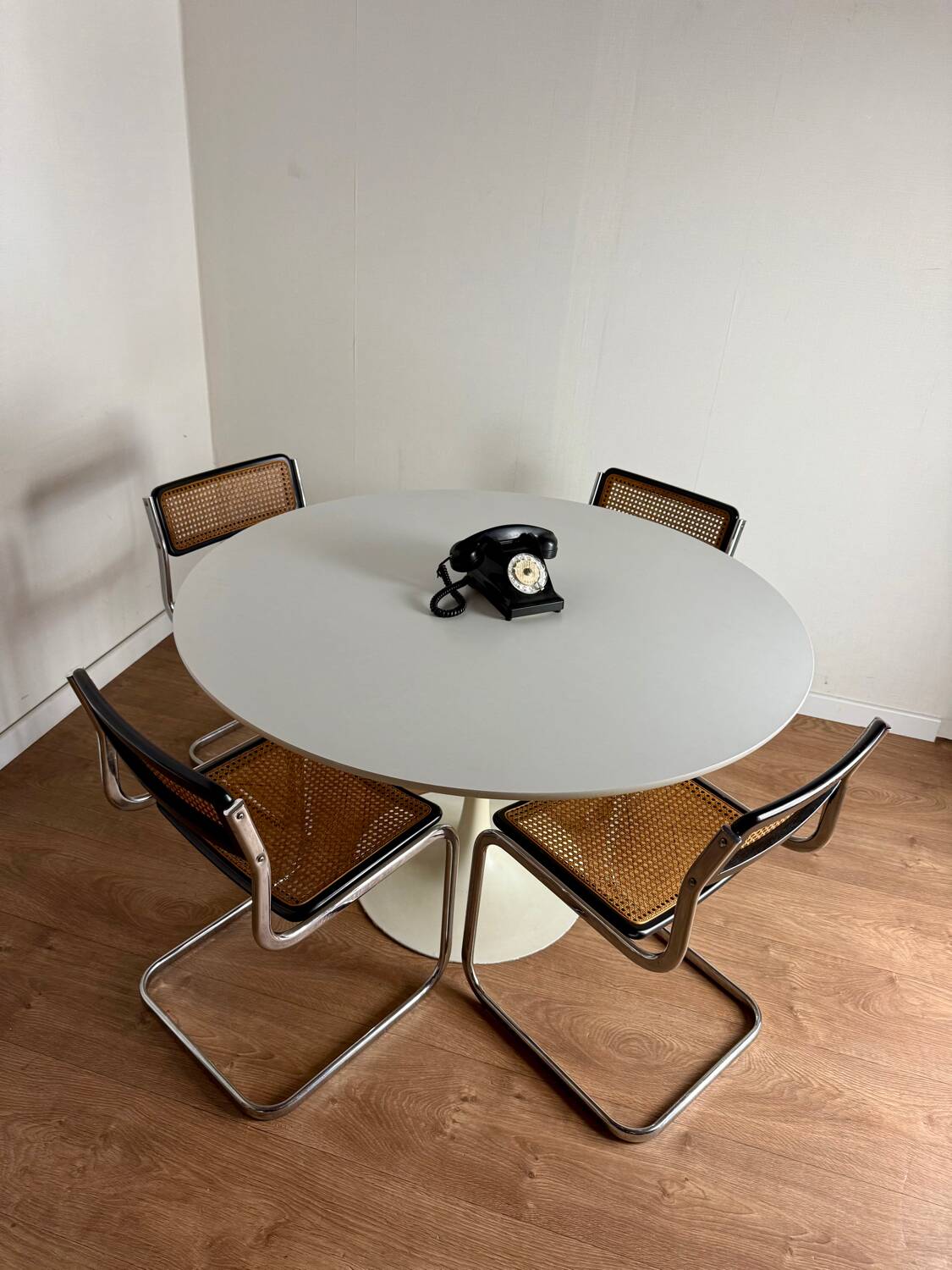 White round tulip-legged table attributed to Arkana