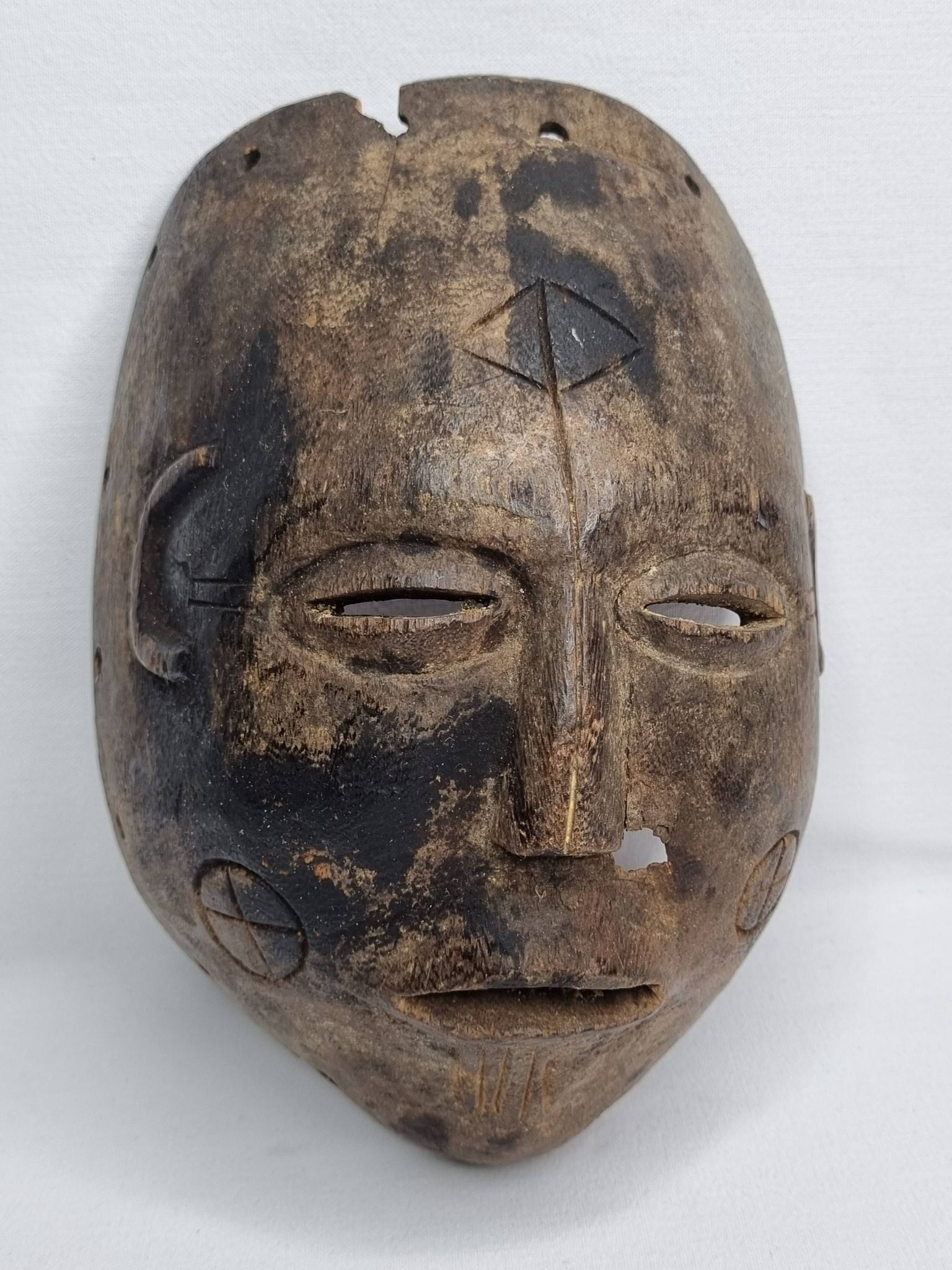 Antique carved wooden tribal mask, early-mid 20th century