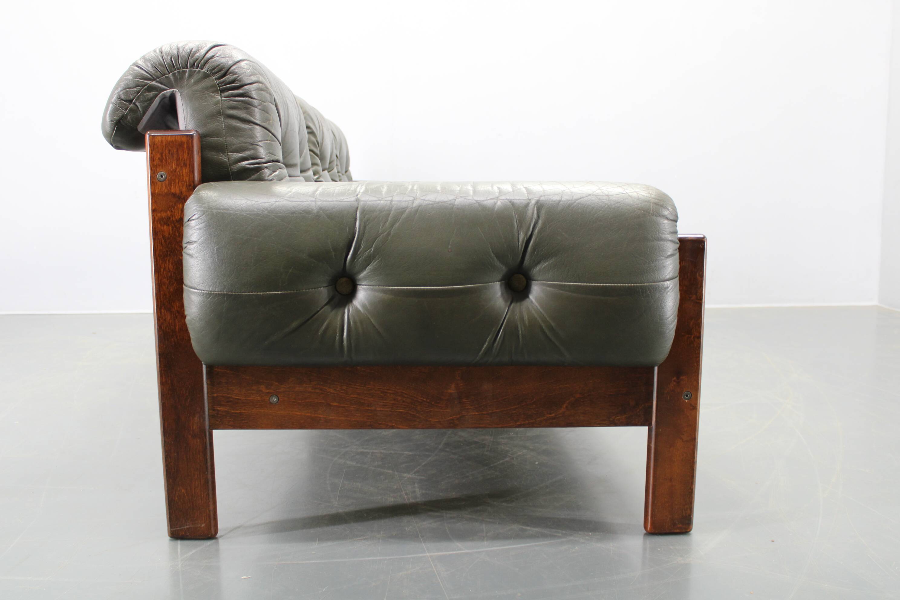 Mid-century Czechoslovak green leather sofa, 1970s