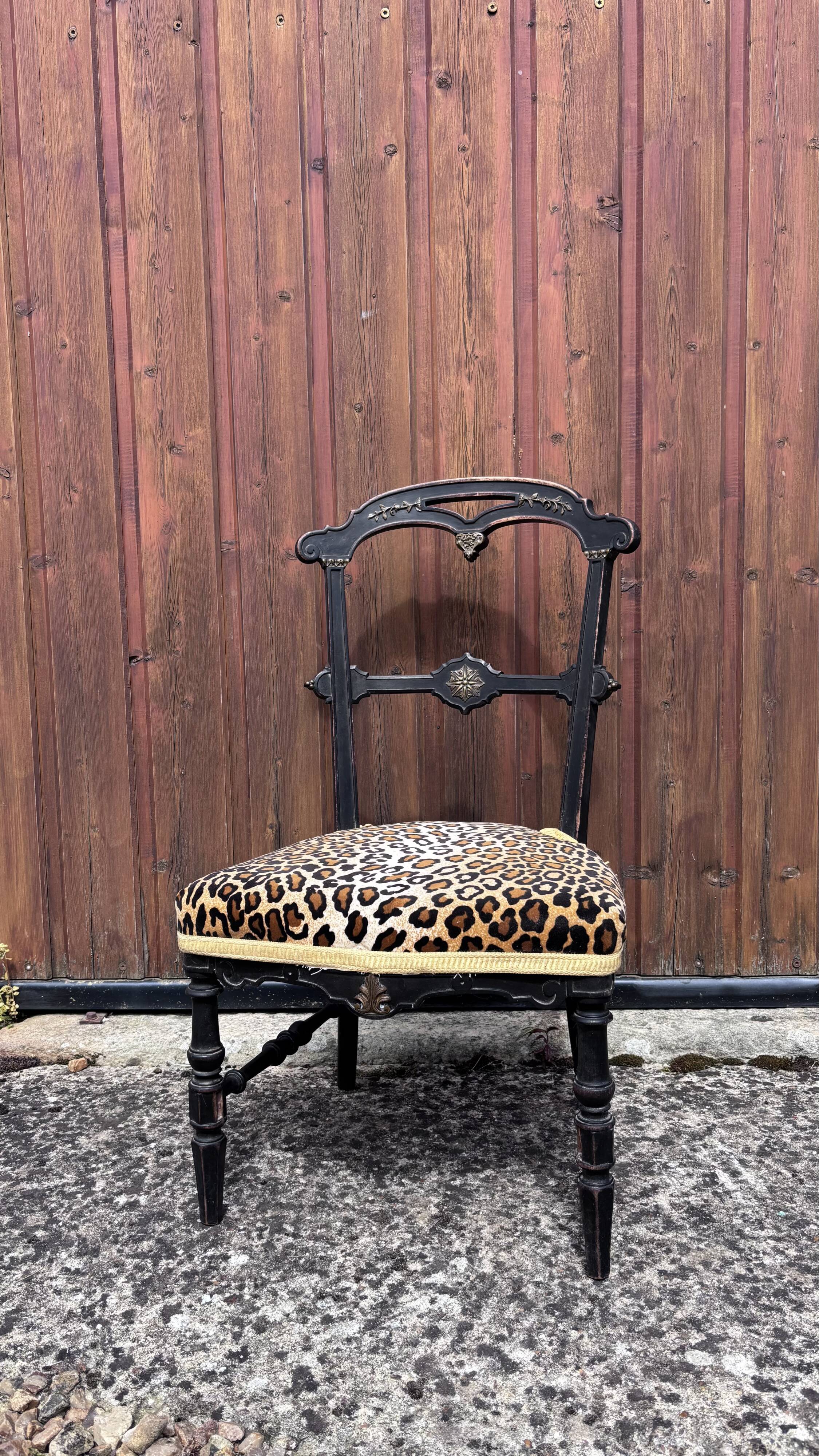 Napoleon III chair reinterpreted – Leopard seat & patinated black wood