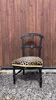 Napoleon III chair reinterpreted – Leopard seat & patinated black wood