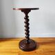 Turned solid wood side table