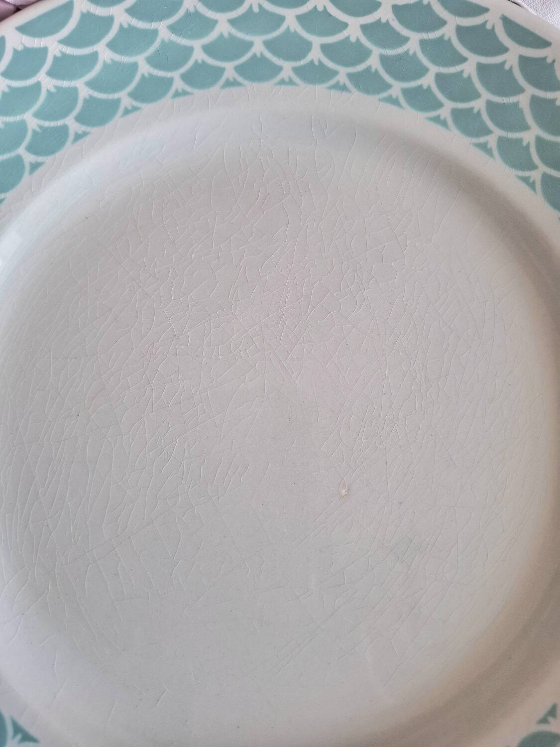 Mismatched antique flat plates in earthenware.