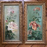 Two old paintings of flowers and gilded frames