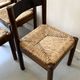 Lot of 4 modernist chairs in solid wood, leather and straw, Italy 1970.