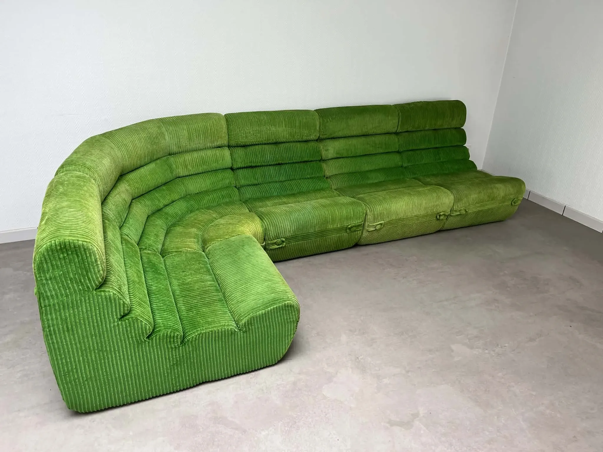 Modular green velvet corner sofa, 1970s