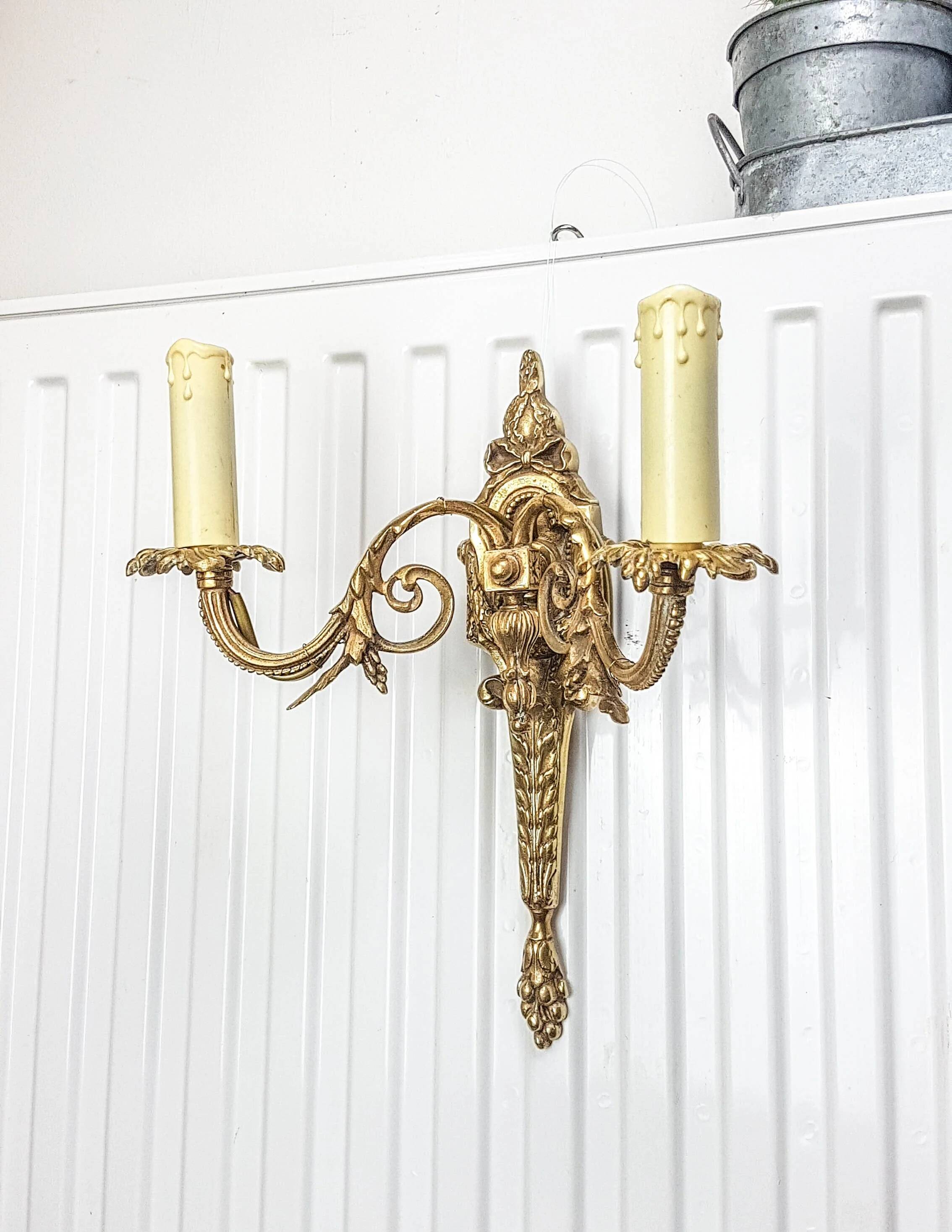 Bronze wall sconce in Empire style