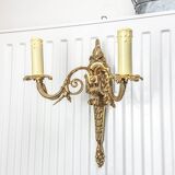 Bronze wall sconce in Empire style