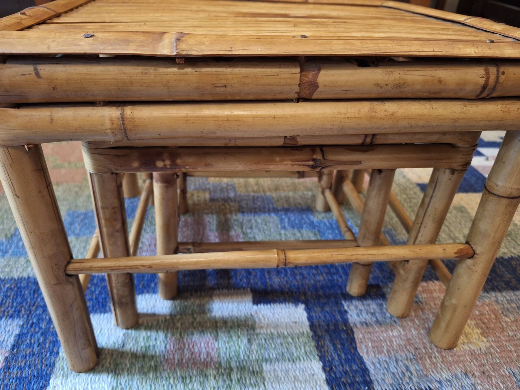 Mid century nest of 3 patinated bamboo tables, 1960s