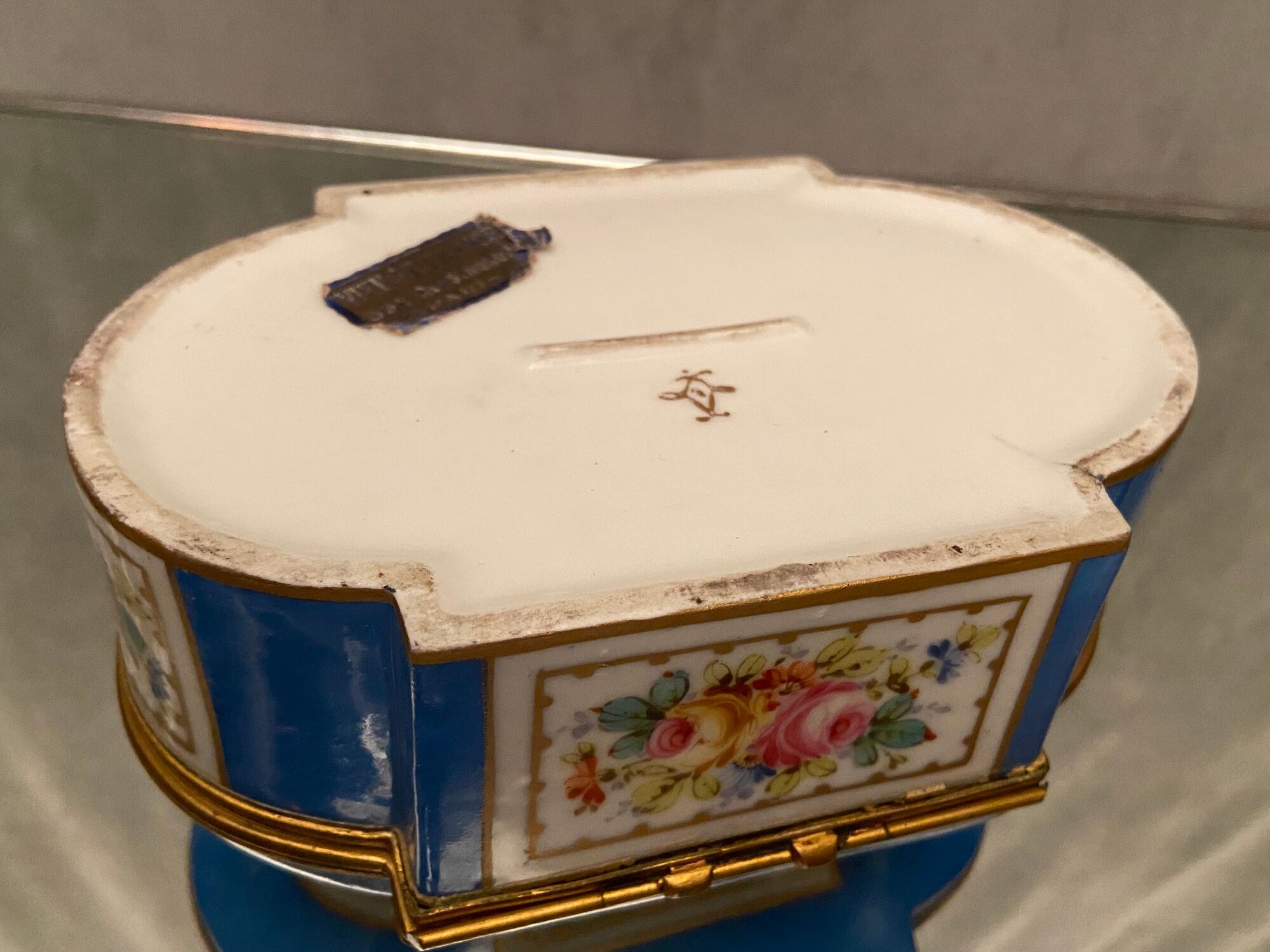 Domed porcelain box polychrome floral decoration on blue background brand Sèvres