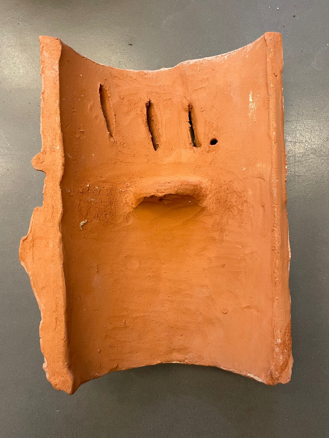 Terracotta sculpture wall light