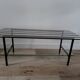 Vintage coffee table in glass and mirror strips.