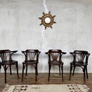 Série de 4 fauteuils vintage en bois courbé – Élégance intemporelle
