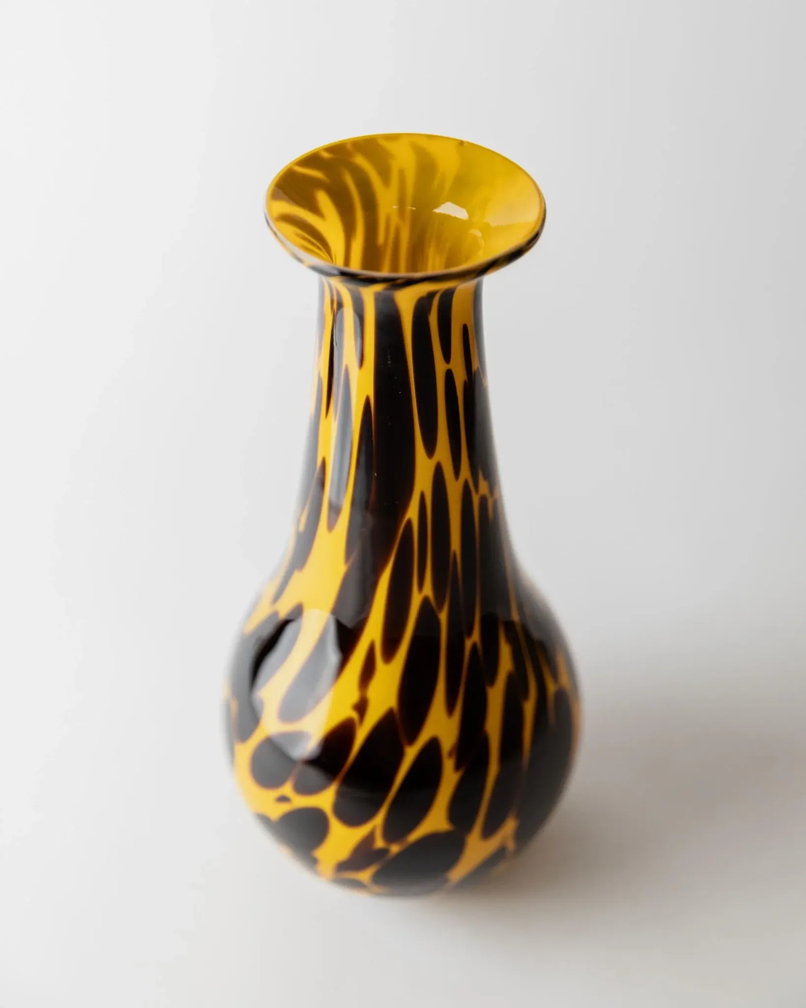 Vintage Murano glass vase from the 1990s, yellow art glass with black spots, postmodern Italian design.