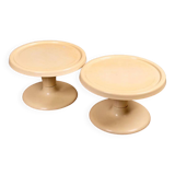 Set of two circular cream plastic sofa ends, 60s/70s