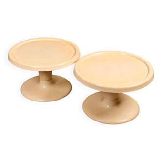 Set of two circular cream plastic sofa ends, 60s/70s