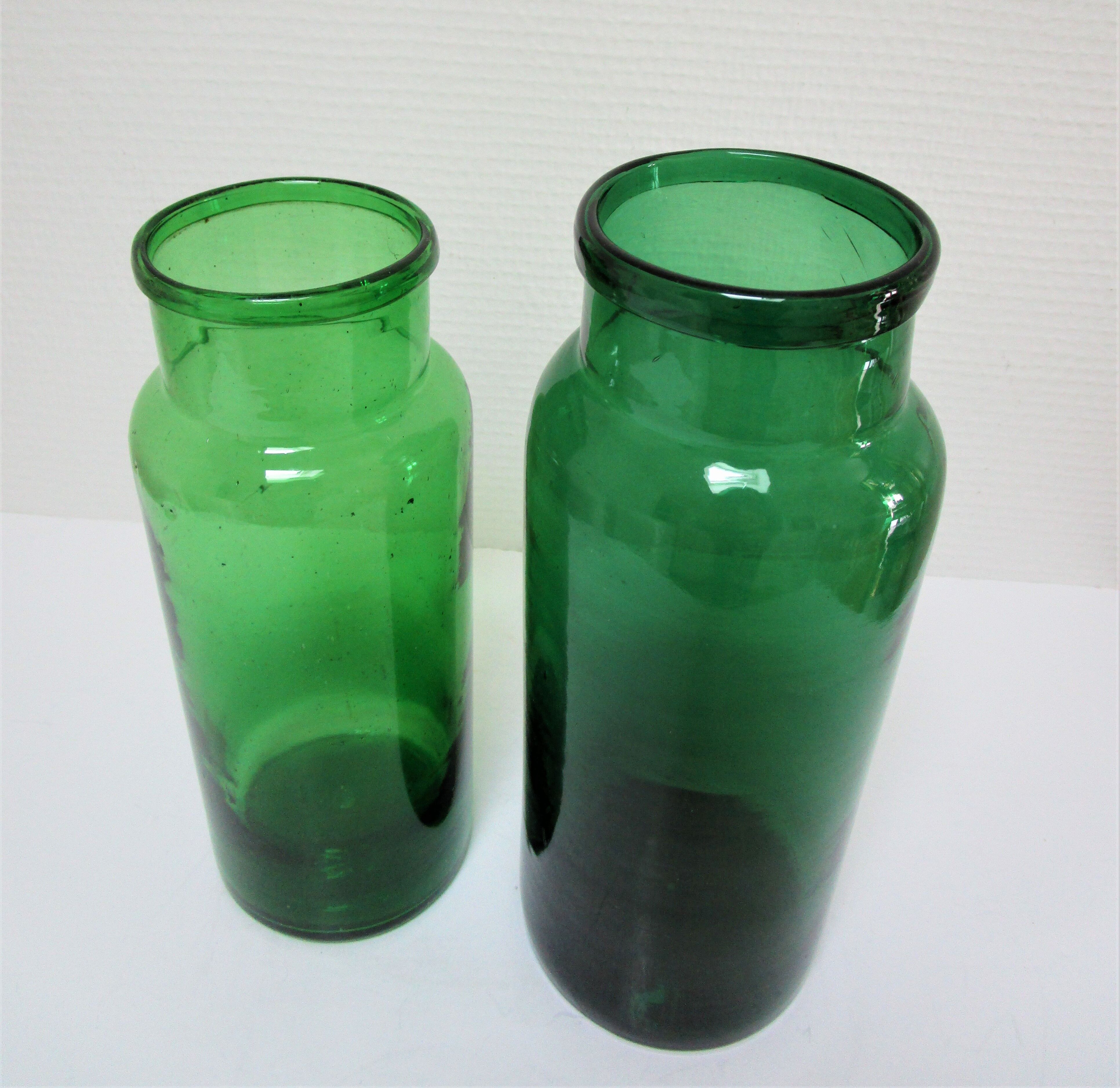 Two old green blown glass jars early 20th century