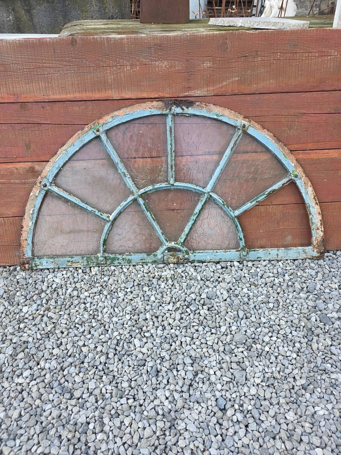 Old wrought iron full riveted gates from the 19th century.