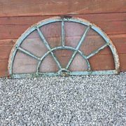 Old wrought iron full riveted gates from the 19th century.