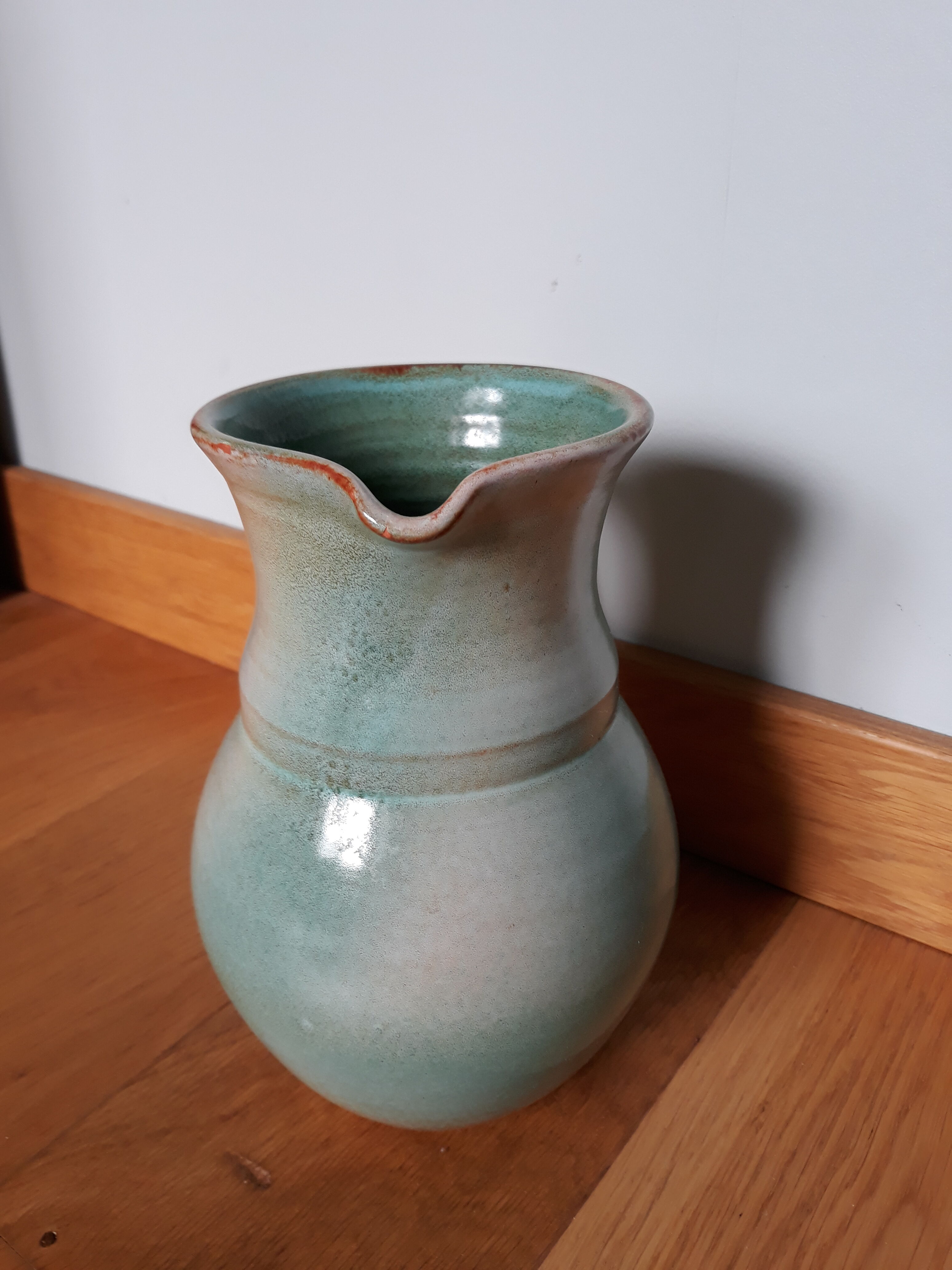 Pitcher with handle green celadon turquoise and caramel