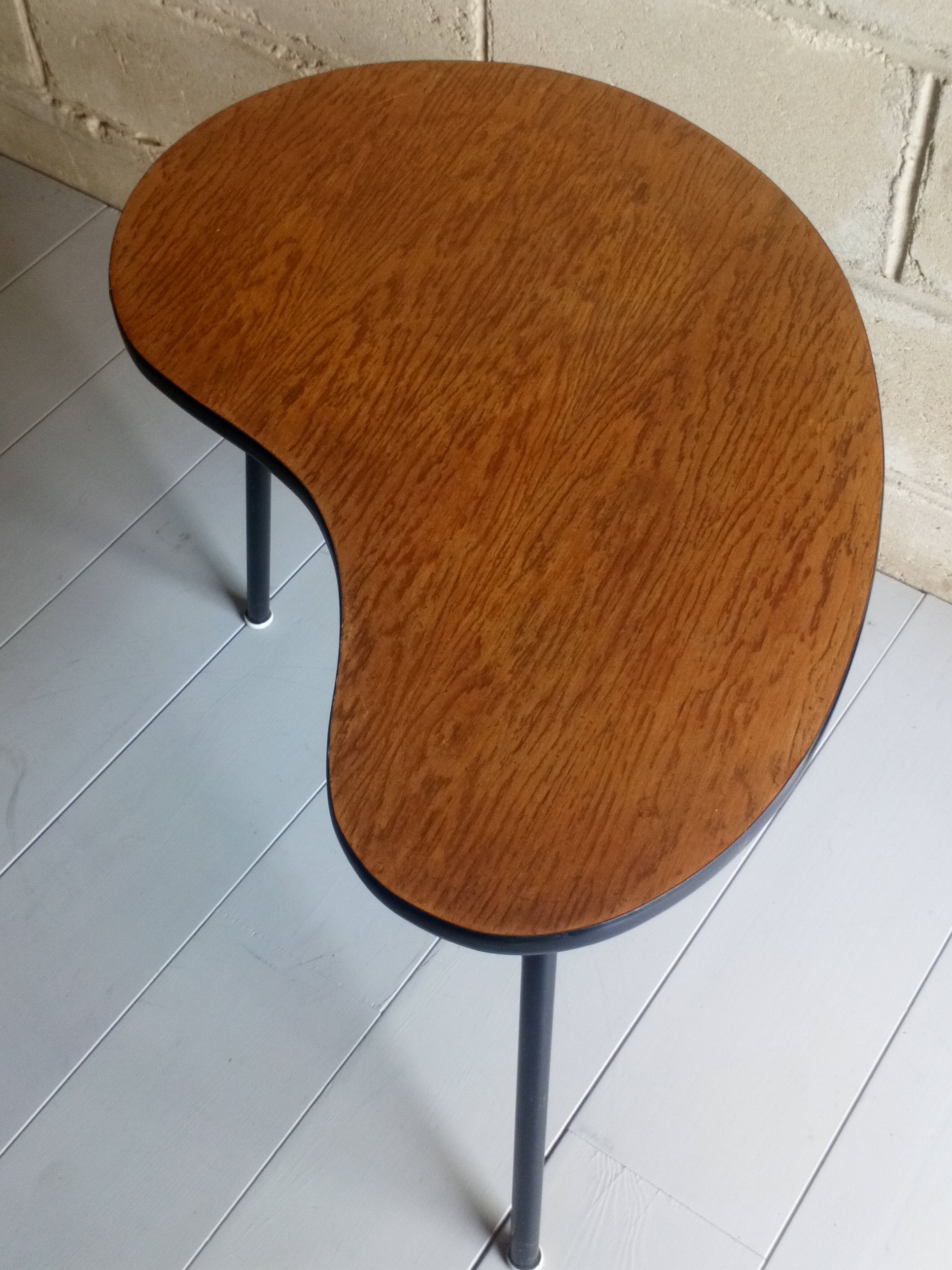 Scandinavian side table shaped bean with three feet