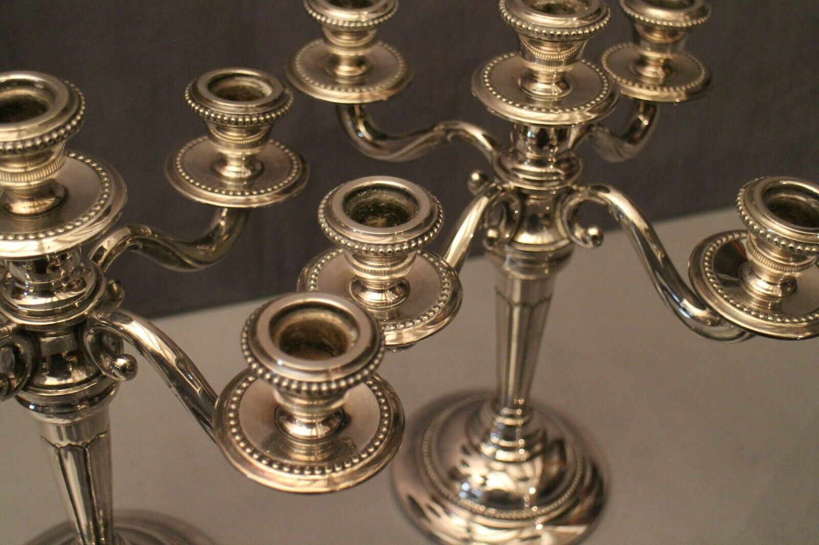 Pair of large candlesticks with 4 silver metal lights in Louis XVI style