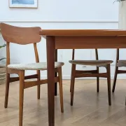 Vintage extendable dining table with 2 extensions in teak.