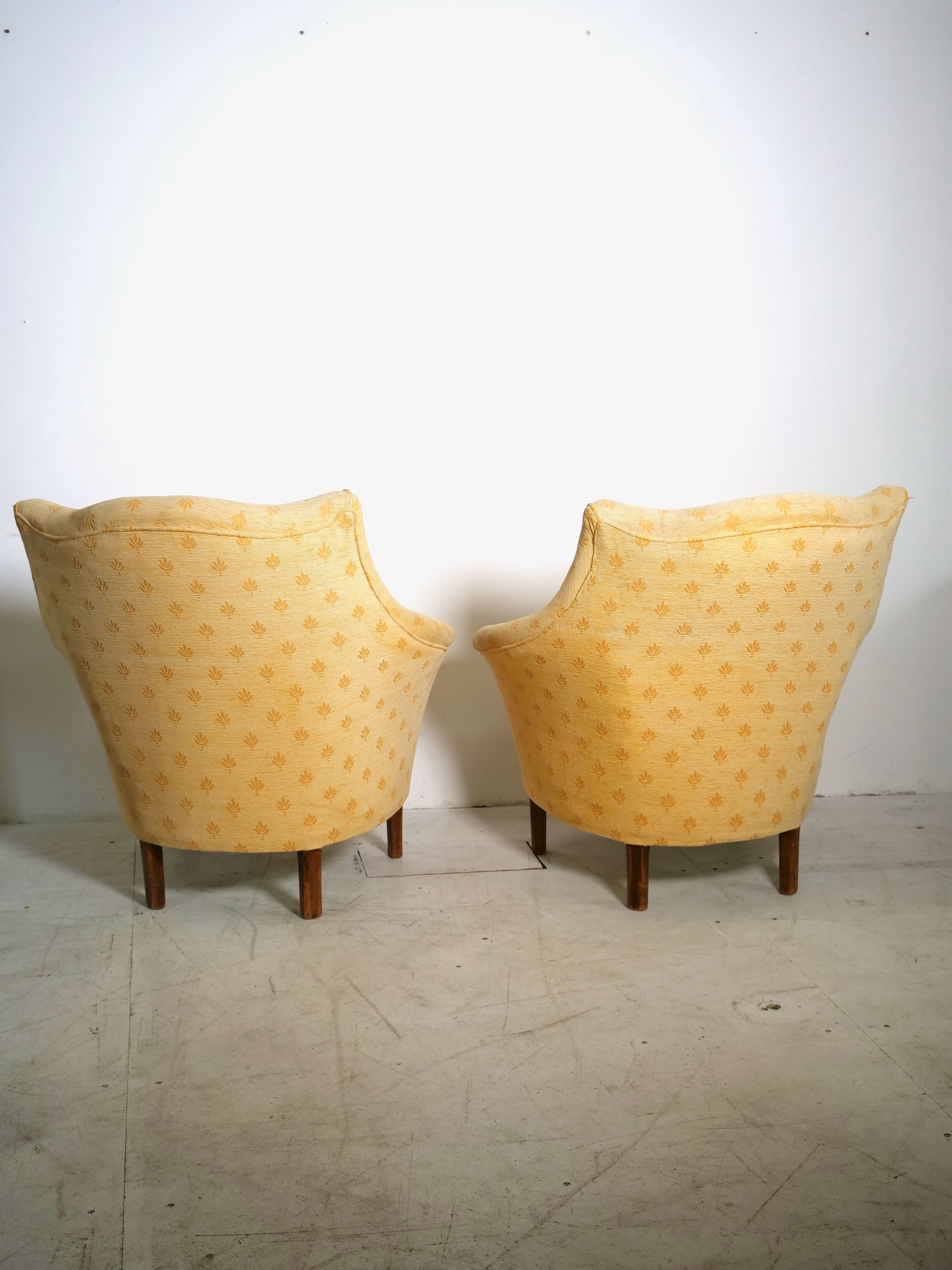 Pair of yellow vintage armchairs