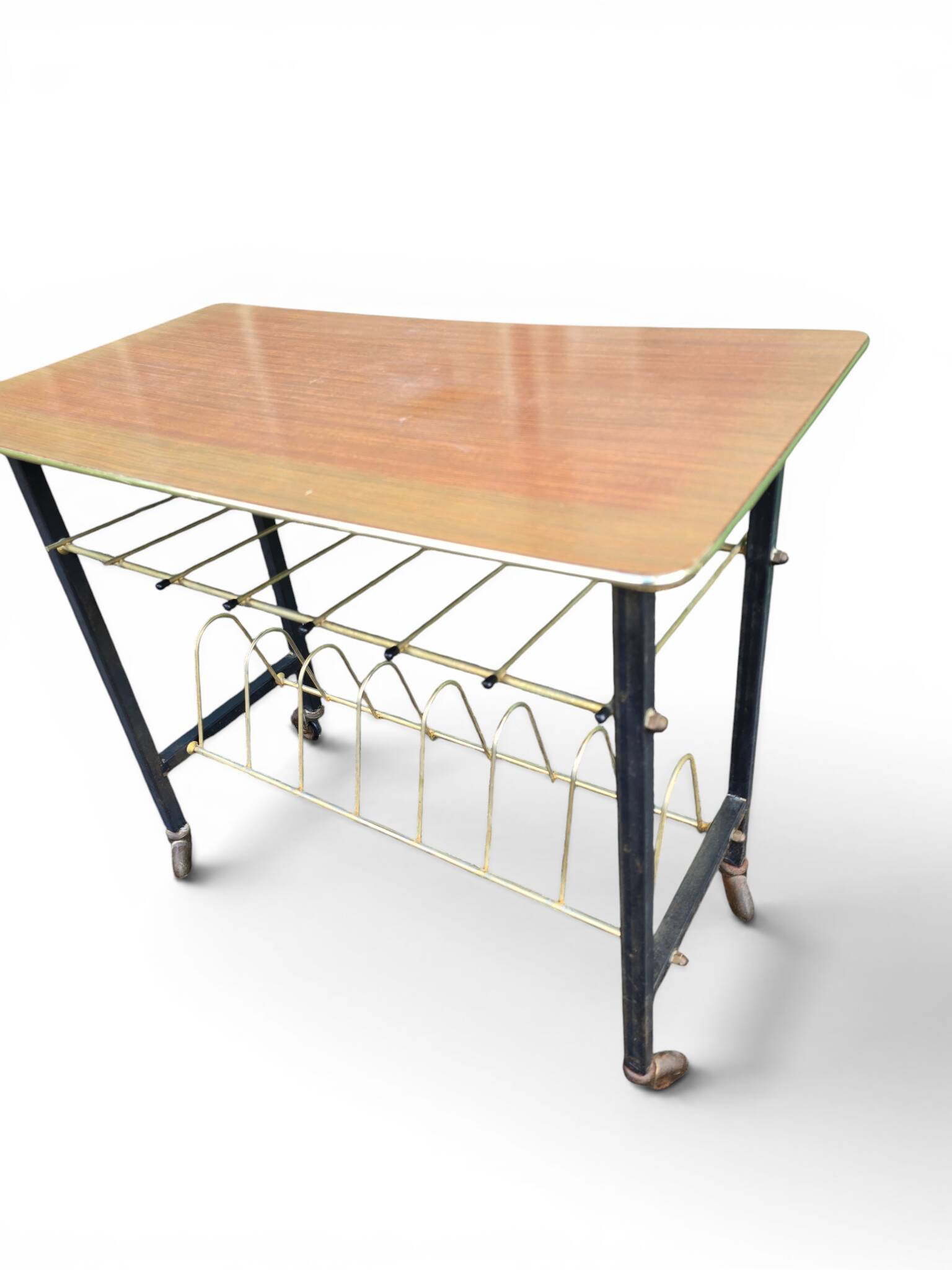 Vintage 1950s magazine table in metal and formica.