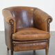 Characterful sheepskin leather club armchair with a luxurious, rustic appearance