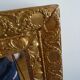 Wood and gilded stucco wall mirror
