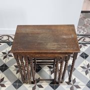 4 antique nesting tables made of turned wood