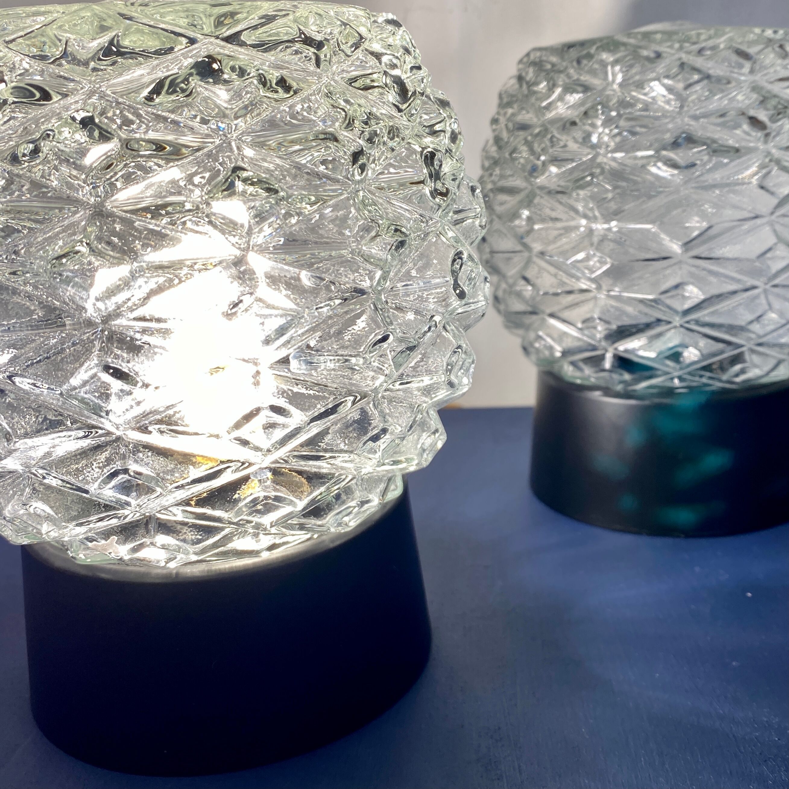 Pair of vintage wall lamps in molded glass and thermoplastic