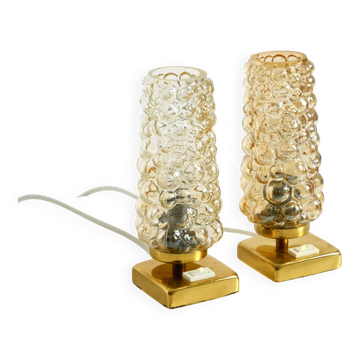 Two rare 1960s brass bedside lamps with gold bubble glass shades