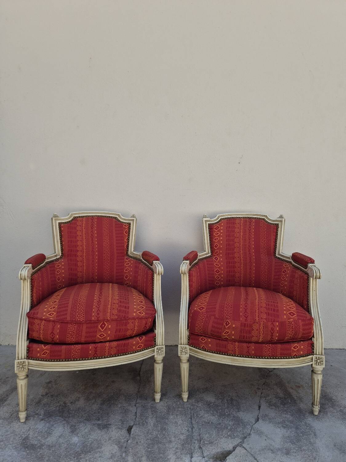 Pair of Louis XVI style bergère armchairs, antique.