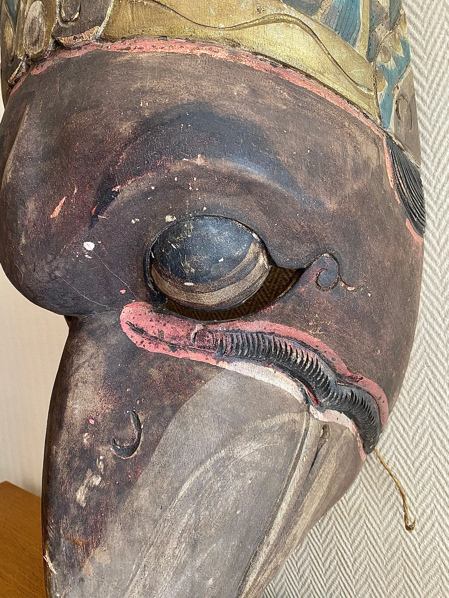 Grand traditional Indonesian mask carved from wood.
