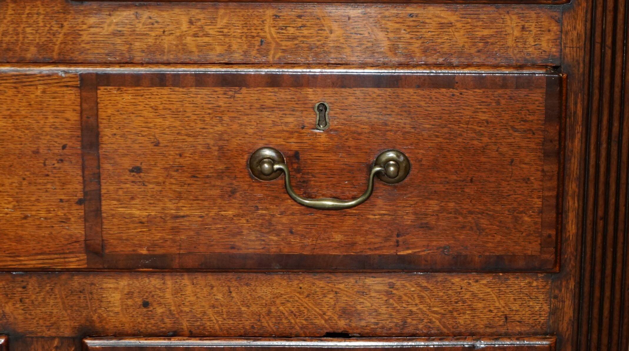 Georgian oak commode with a folding top, English, 18th century.