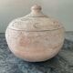 Vintage terracotta pot with lid.