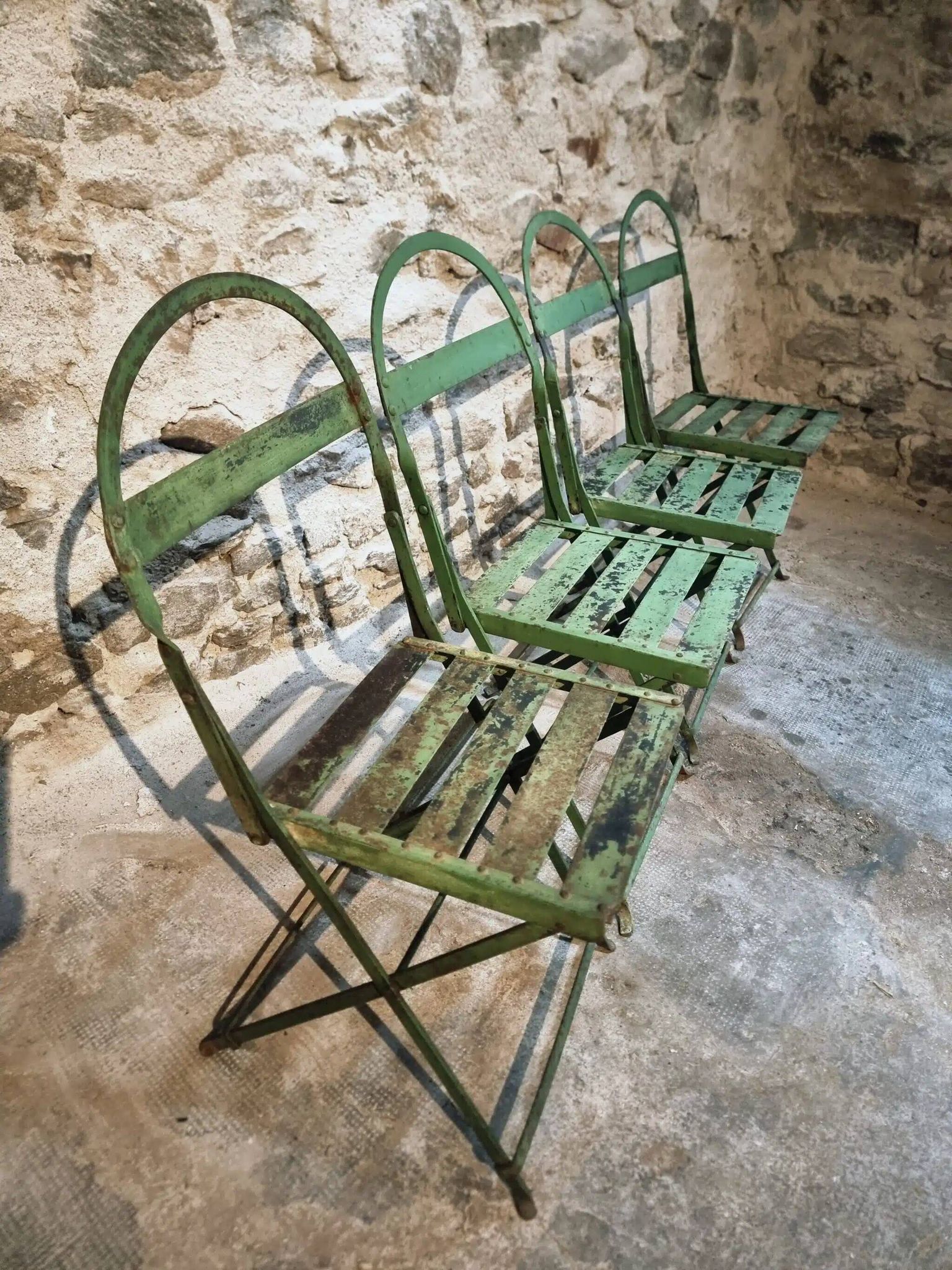 Set of 4 Antique Iron Folding Garden Chairs - 1920s Riveted Bistro Chairs with Aged Green Patina