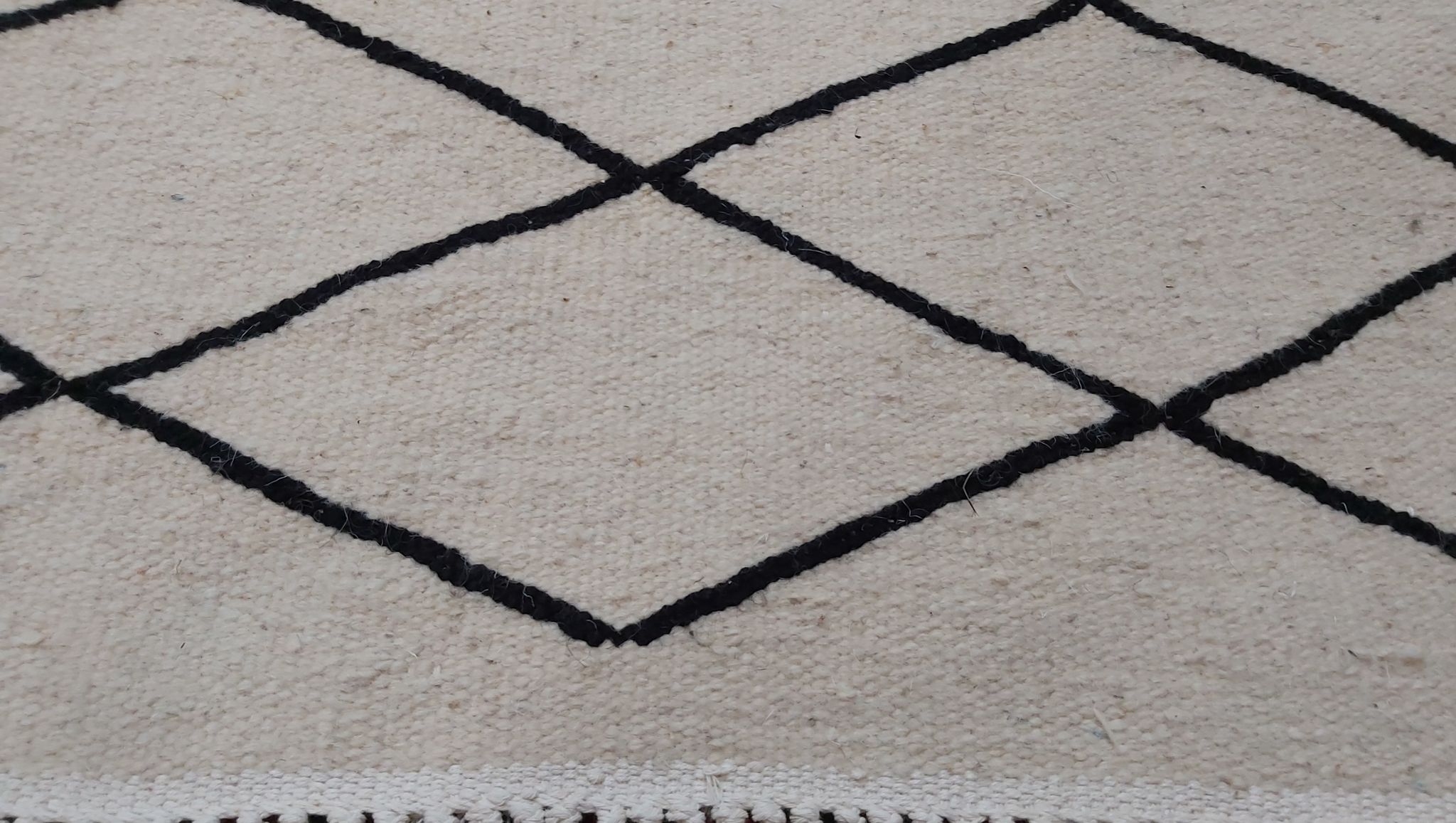 Handmade white and black Berber carpet 245x156cm