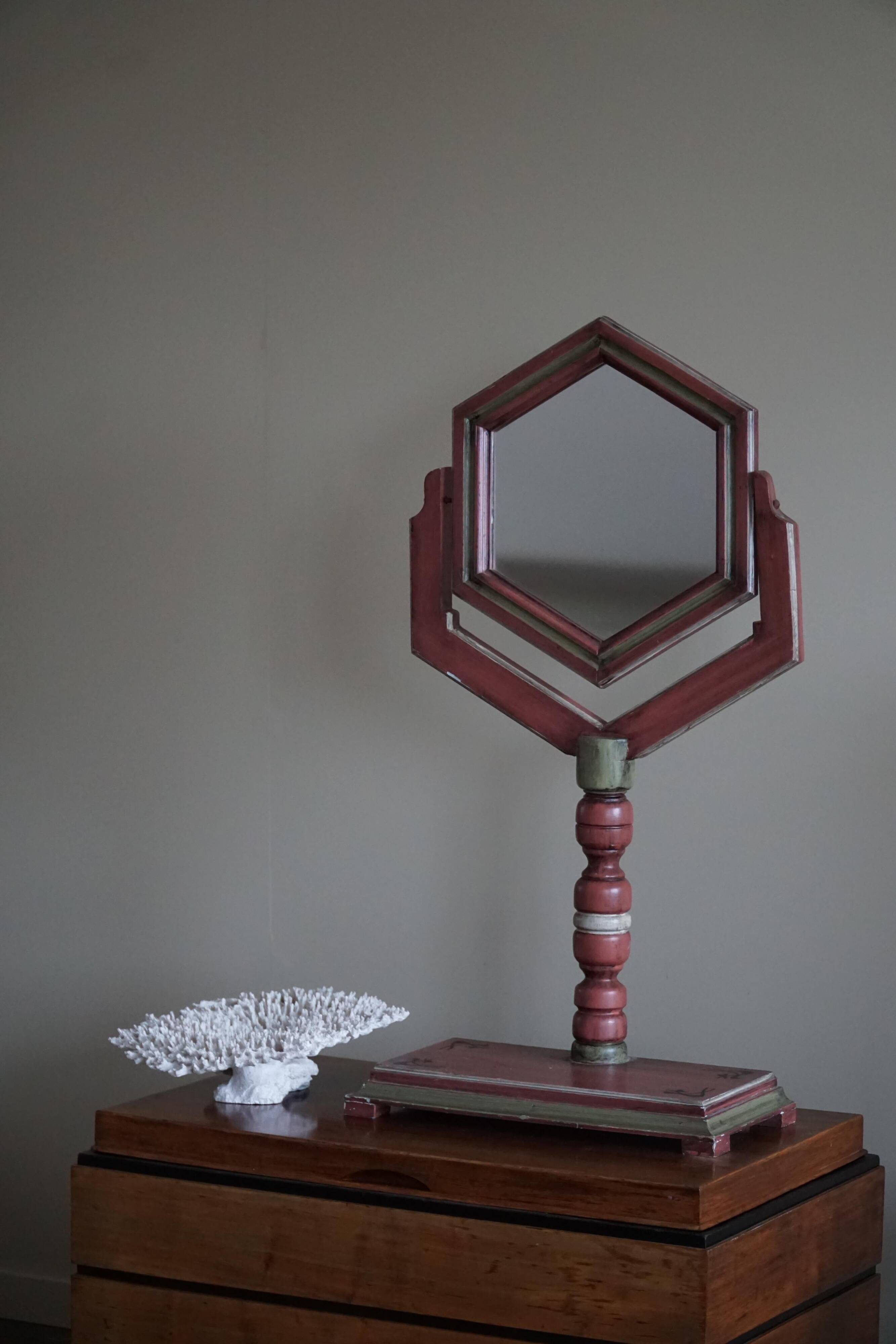 A pine table mirror by a Swedish cabinetmaker, folk art, early 20th century.