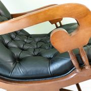 Black leather rocking Chesterfield armchair