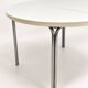Vintage round extendable dining table, white laminate on chrome legs.
