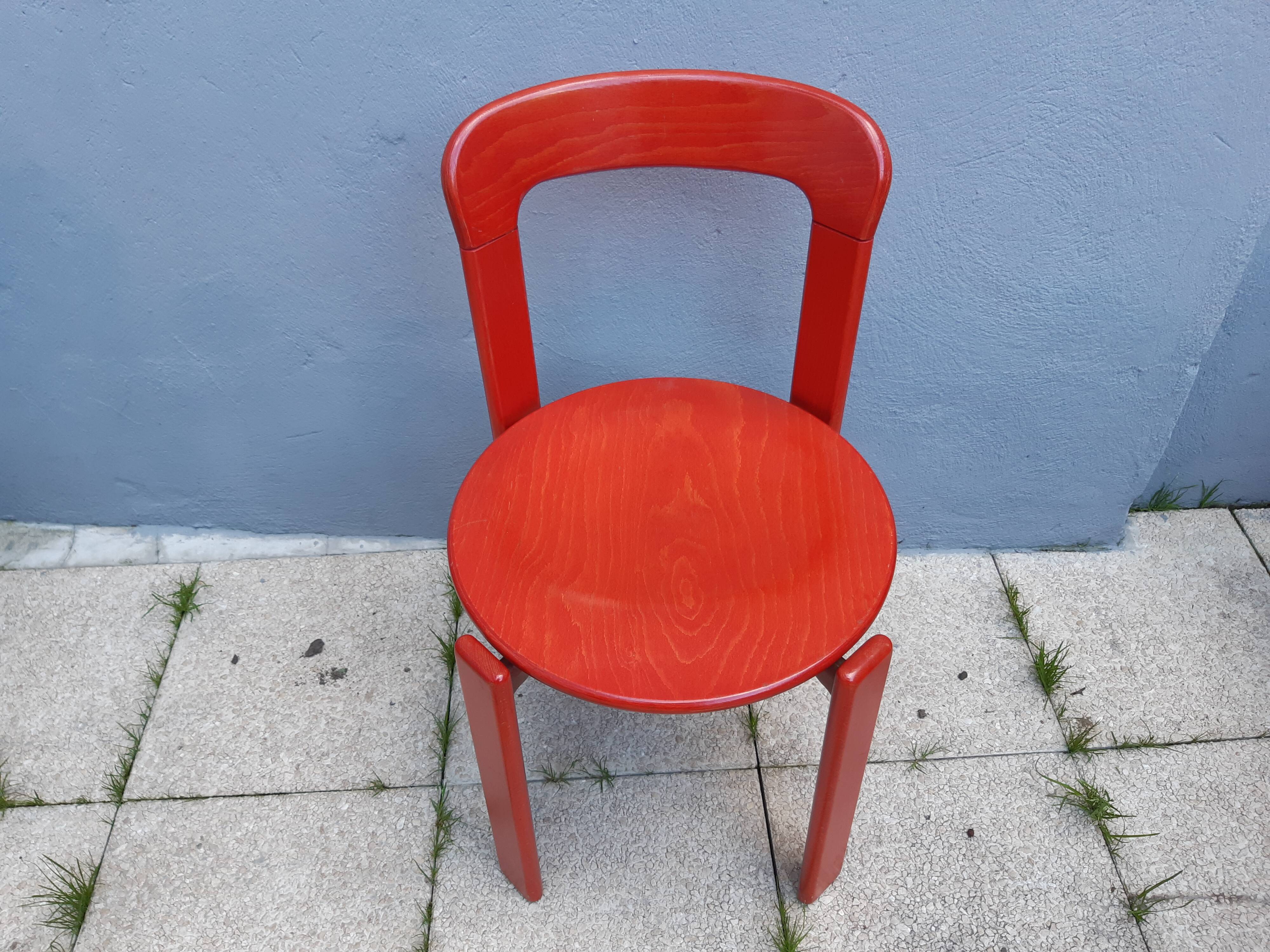 Set of 10 red wooden chairs by Bruno Rey for Kusch&Co