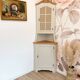 Corner unit in 2 parts, grey/beige and cane work.