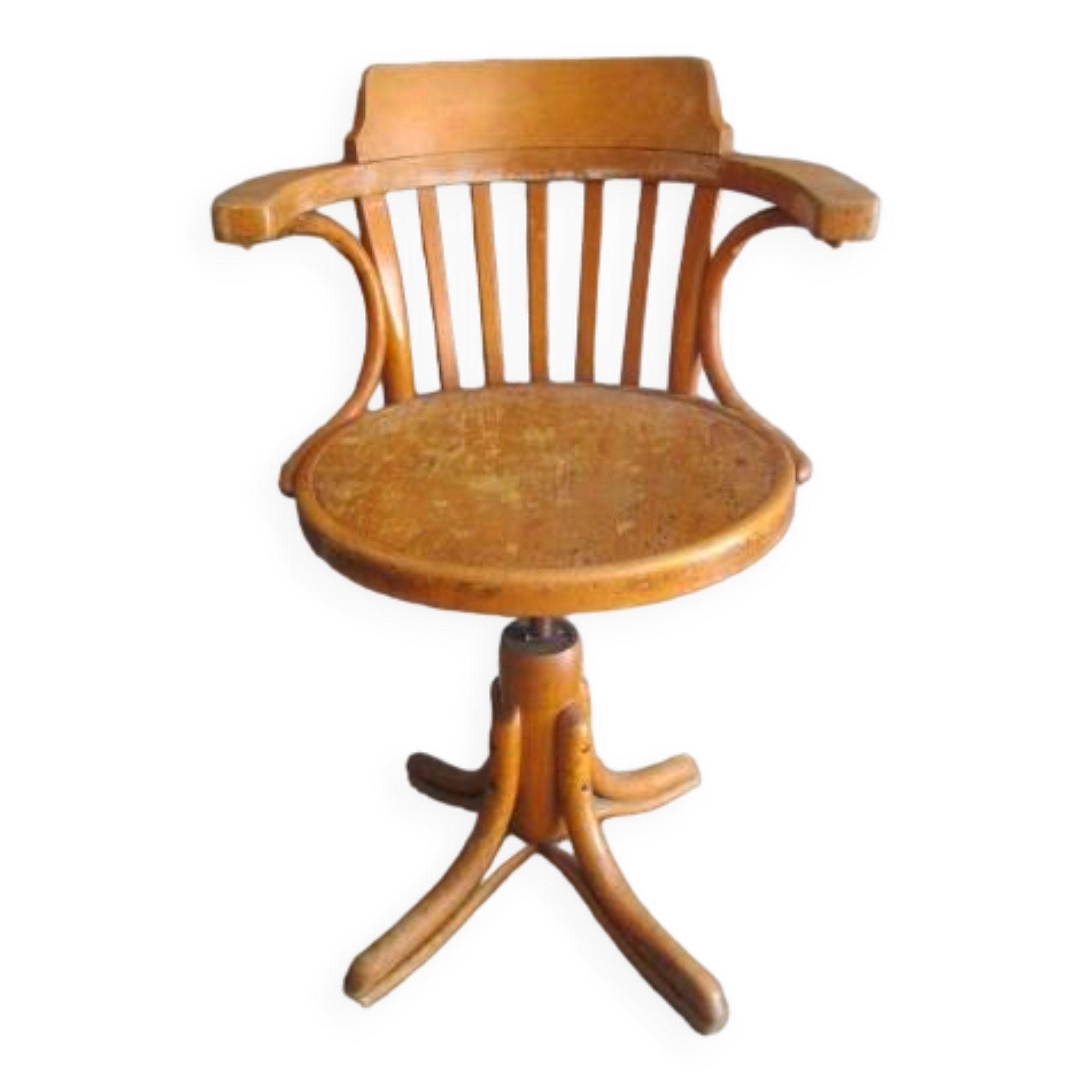 Old swivel office armchair in curved wood