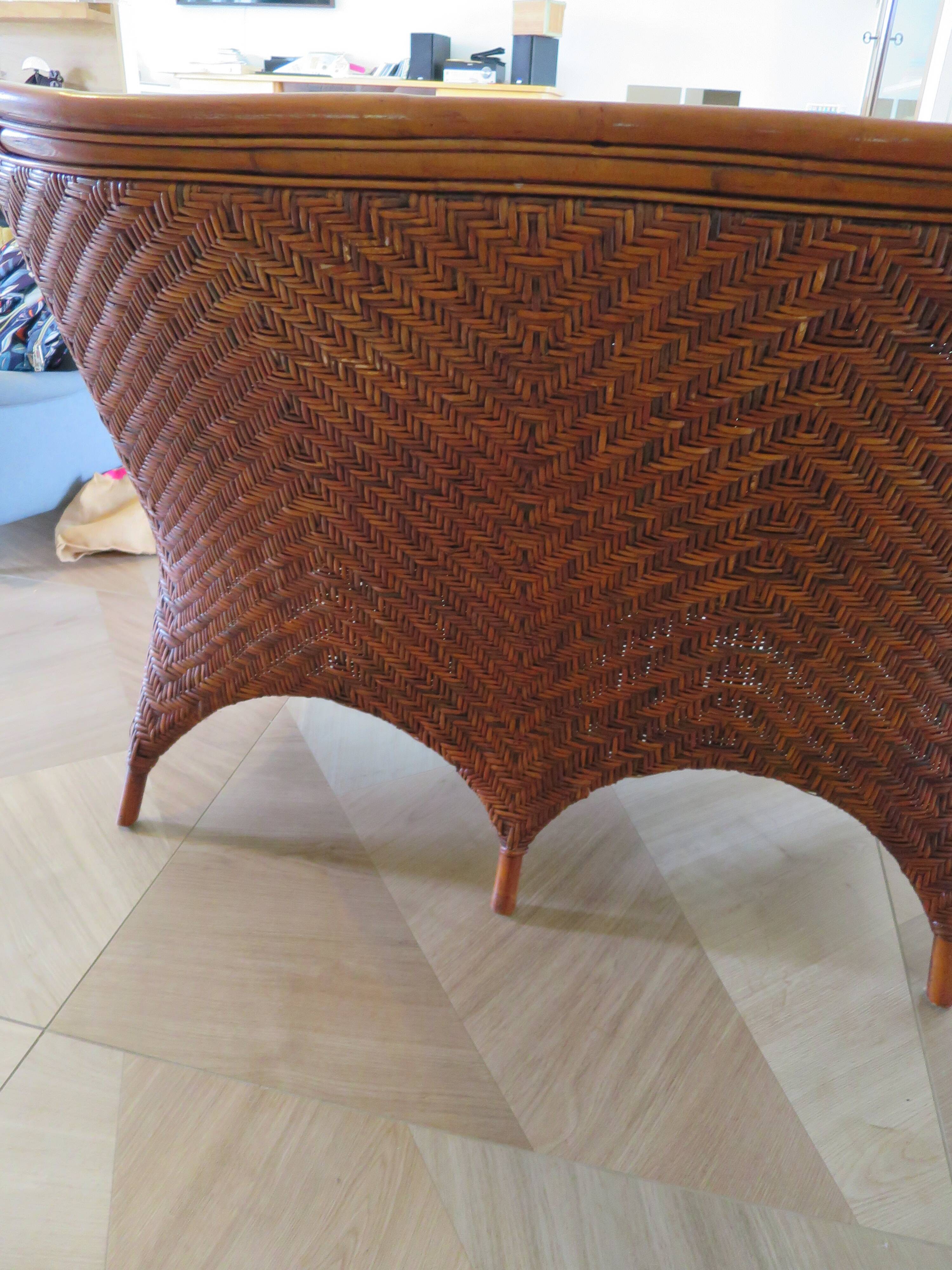 Two-seater banquette in woven rattan, wood and bamboo, 1980s.